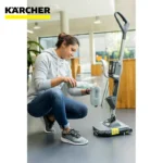 Kärcher cleaning robot with spray bottle in modern office setting, promoting beyond hygiene solutions.