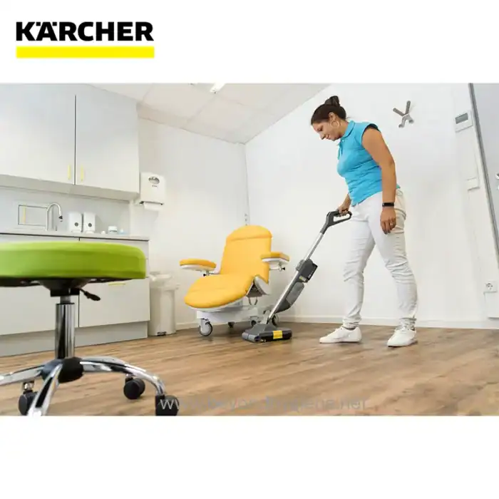 High-quality image of a woman cleaning office space with professional equipment, highlighting Beyond Hygiene Asia's commitment to commercial cleaning services in Southeast Asia.