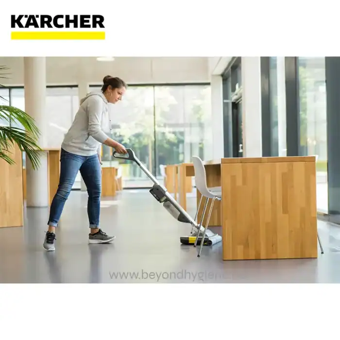 Karcher commercial vacuum cleaner in modern office environment, effective cleaning tool for hygiene and sanitation.