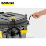 Heavy-duty industrial vacuum cleaner with flexible hoses and durable components for commercial cleaning applications in Asia.