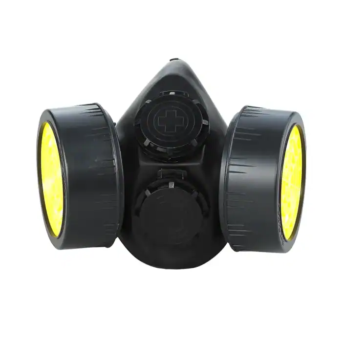 Respirator mask with dual filters, black with yellow filter caps, for industrial or hazardous environment protection.