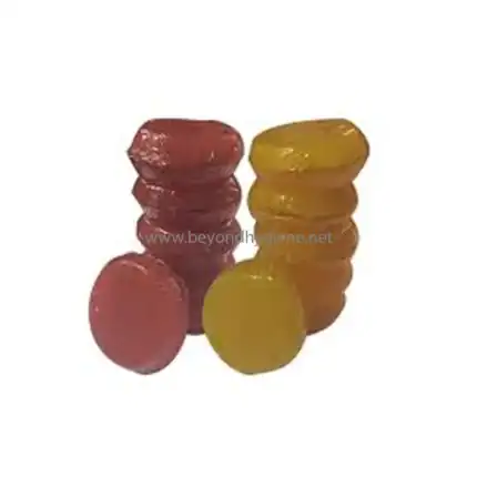 Gummies candies stacked in red and yellow colors, showcasing vibrant confectionery treats.