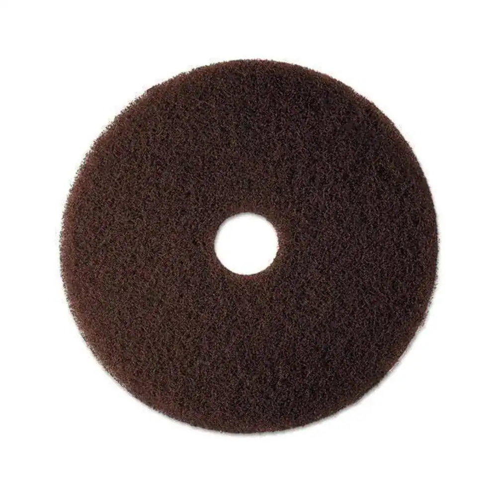 Floor Pad - Scrubbing Brown 16 Black polishing wheel for industrial cleaning and polishing applications. Suitable for use in factories, workshops, and commercial cleaning services. Durable and high-quality abrasive tool.