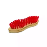 Red hand massage brush with wooden handle for skin cleansing and exfoliation. Perfect for soothing skin and improving circulation. Ideal for personal hygiene and spa treatments.