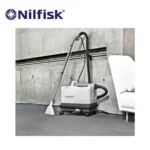 Nilfisk industrial vacuum cleaner cleaning an office space for hygiene and sanitation.
