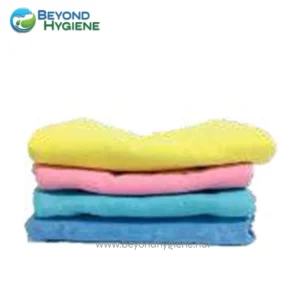 Microfiber cleaning cloths in yellow, pink, and blue for hygiene and sanitation purposes.