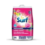 Luxurious pink laundry detergent bag with floral design, high foam, stain removal, and 303 washes capacity, ideal for professional cleaning.