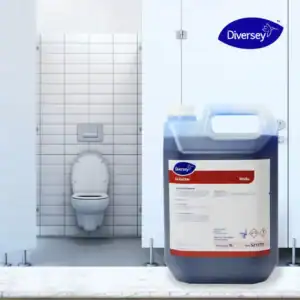 Disinfectant toilet bowl cleaner in front of a clean bathroom with a toilet, promoting hygiene and sanitation for public and commercial restrooms.