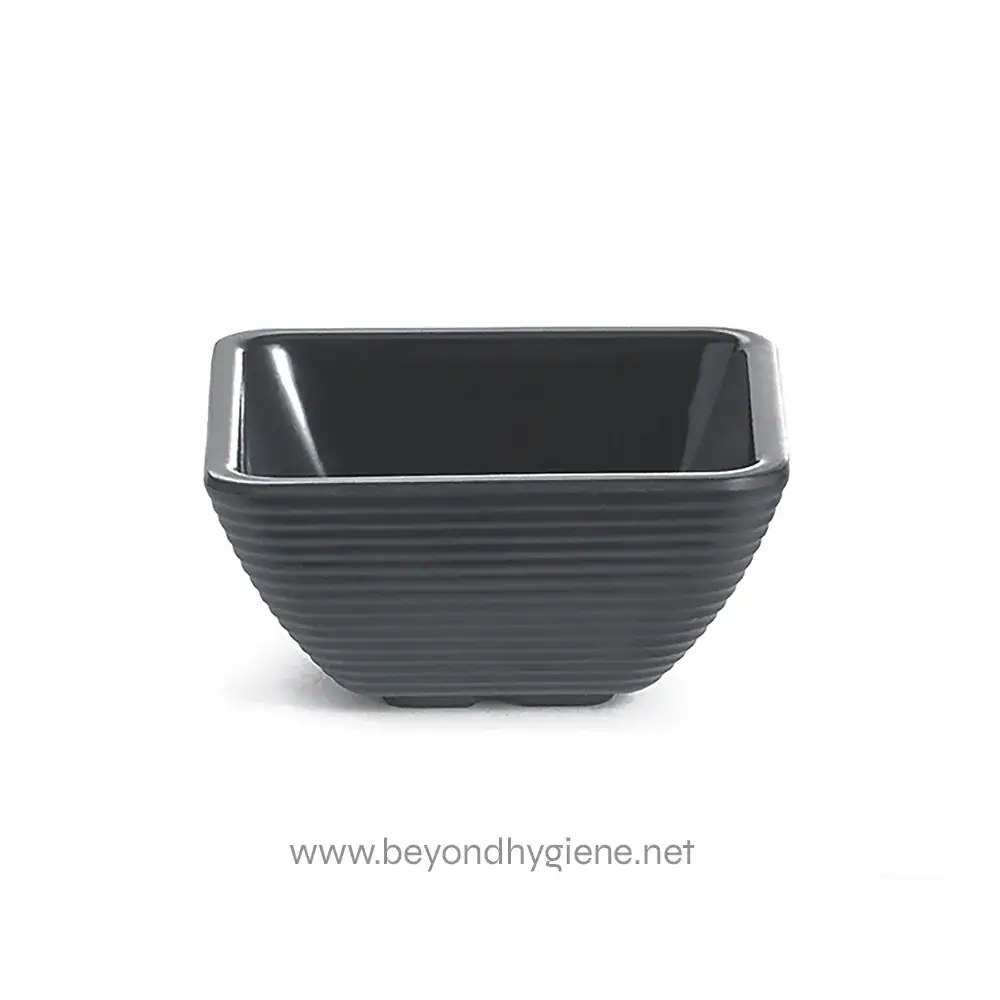 1 Black ceramic serving bowl with textured exterior, ideal for cuisine presentation or kitchen decor. Perfect for restaurants, cafes, or home dining, showcasing sleek and modern design.