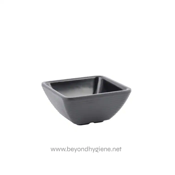 Black square ceramic bowl with textured exterior, ideal for hygiene, dining, or decorative purposes. Durable and stylish for commercial or home use.