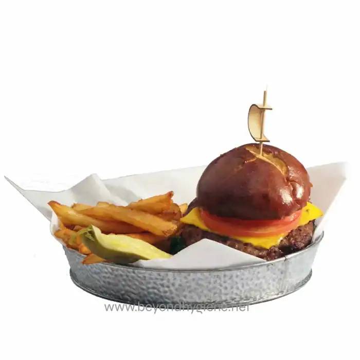 Burger with fries and pickles on a paper-lined tray, showcasing food hygiene standards, suitable for a food service cleaning or hygiene company in Asia, emphasizing cleanliness and food safety.