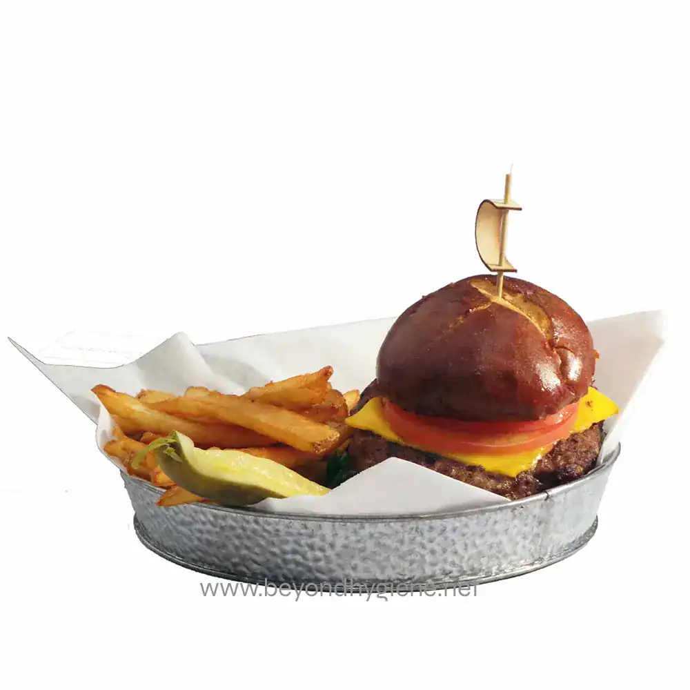 BAMPS45_MRC-01 Burger with fries and pickles on a paper-lined tray, showcasing food hygiene standards, suitable for a food service cleaning or hygiene company in Asia, emphasizing cleanliness and food safety.