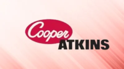 Cooper Atkins logo on a pink background, representing a brand known for temperature monitoring solutions in food safety and hygiene industries.