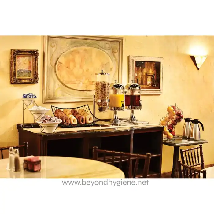 Fresh breakfast buffet setup at Beyond Hygiene Asia, featuring cereals, pastries, and beverages in a cozy, elegant environment. Perfect for hospitality and commercial hygiene standards.
