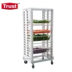 Trust white plastic vegetable storage trolley with multiple ventilated shelves for fresh produce handling and transportation.