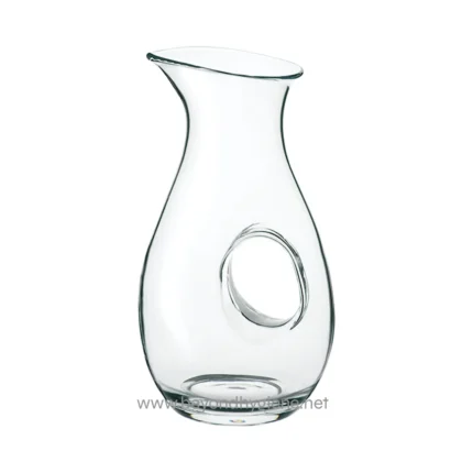 Durable glass pitcher for beverage service, perfect for hospitality or home use, with a sleek modern design and sturdy construction.
