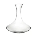 Clear glass decanter for alcohol or beverages, elegant and stylish. Perfect for home or bar use, showcasing sophisticated drink serving options.