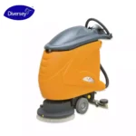 Diversey industrial floor cleaning machine, orange and gray, used for commercial and industrial cleaning, featuring rotating brushes and a compact design for efficient sanitation.