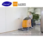 Automatic floor cleaning machine at Beyond Hygiene Asia, professional commercial cleaning equipment, efficient floor scrubber for hygiene and sanitation in healthcare and hospitality environments.