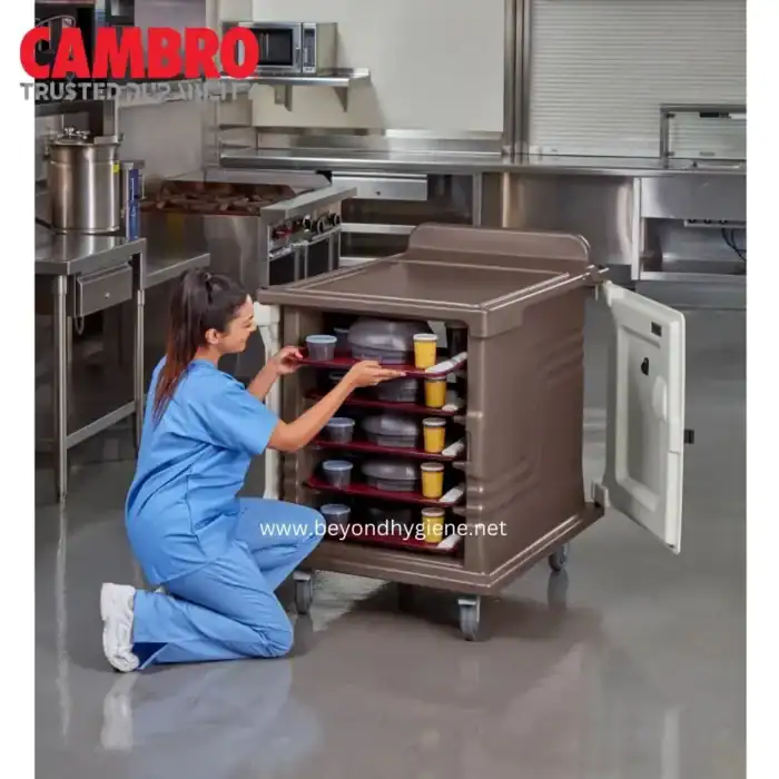 Cleaning staff organizing food containers in commercial kitchen, professional hygiene services, industrial kitchen sanitation, Beyond Hygiene Asia.