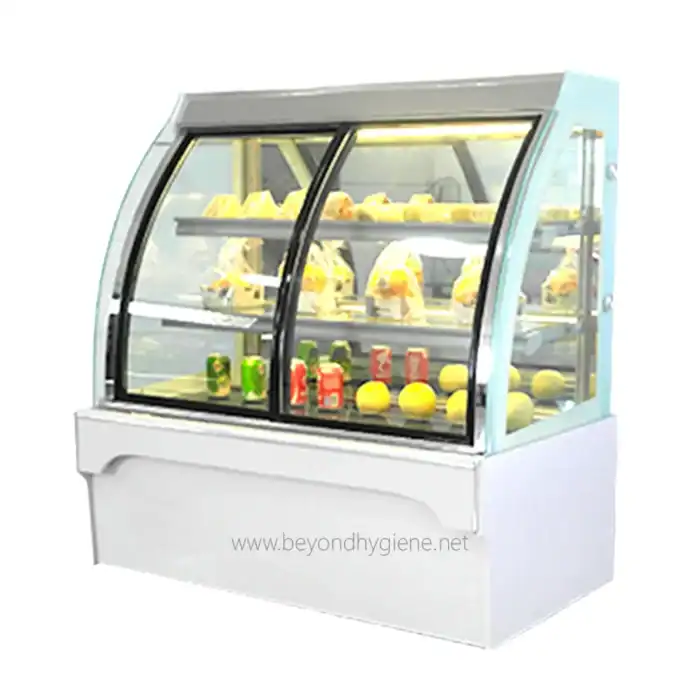 Stainless steel refrigerated display case with glass front for showcasing food products, ideal for supermarkets, convenience stores, and foodservice establishments.