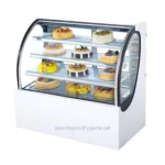 Deluxe refrigerated pastry display case showcasing a variety of colorful cakes and desserts, ideal for bakeries, cafes, and foodservice establishments.