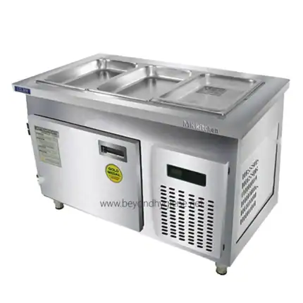 Stainless steel commercial hot and cold food prep table, perfect for restaurant kitchens and catering services. Durable, easy to clean, and designed for efficient food storage and service.