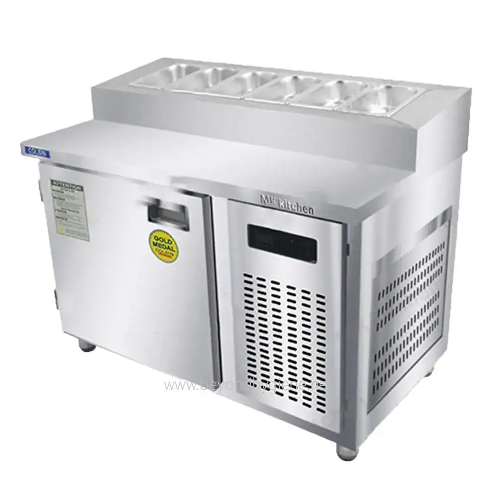 FAB Topping Chiller Stainless steel commercial ice cream freezer with multiple compartments, ideal for food service and beverage establishments, durable and efficient for commercial use.