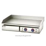 Stainless steel flat-top griddle for commercial kitchens, ideal for cooking diverse dishes in food service businesses. Durable and easy to clean for hygienic food preparation.