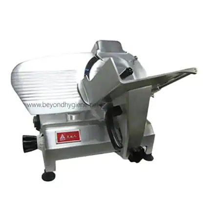 Slices meat on a commercial meat slicer for food preparation.