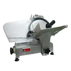Slicing machine used for food processing and meat cutting, showcasing industrial kitchen equipment by Beyond Hygiene Asia.