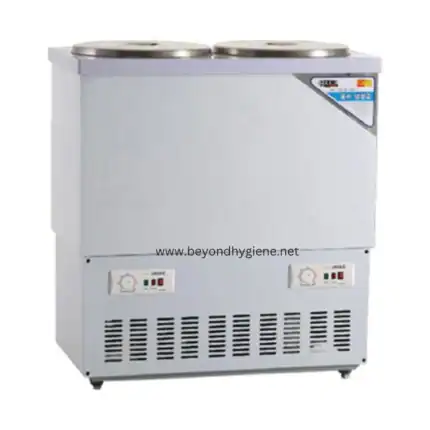 Stainless steel ice cream maker with dual tanks for commercial use, ideal for hospitality and food service industries.