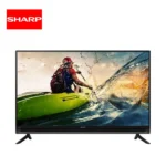 Sharp LED Smart TV displaying a person kayaking on water, vibrant colors, sleek design.