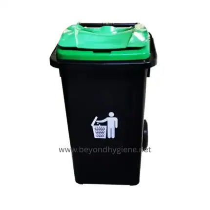 Green and black outdoor trash bin with lid and waste disposal icon, suitable for public hygiene and waste management in Asia, durable trash container for cleaning services beyond hygiene asia.
