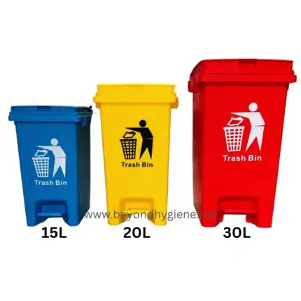 Blue, yellow, and red trash bins with "Trash Bin" label, representing waste disposal solutions in Asia by Beyond Hygiene.