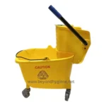 Yellow mop bucket with a wringer and mop handle, ideal for commercial cleaning and sanitation in Asia, featuring caution signage for hygiene safety.
