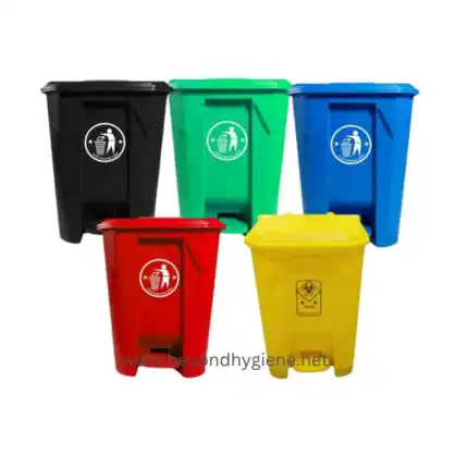 Black, green, blue, red, and yellow plastic waste bins for recycling and waste management in Asia.