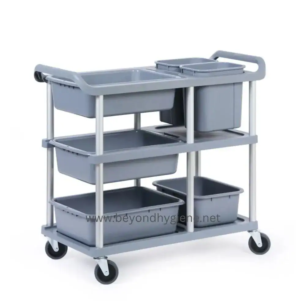 Gray hospital cleaning cart with multiple storage bins and wheels for easy mobility.