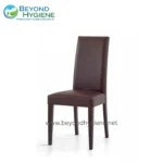 Elegant brown dining chair with high backrest, ideal for restaurant and hospitality interiors, emphasizing comfort and style. Perfect for professional hygiene and sanitation environments.