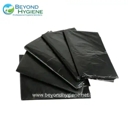 Black disposable hygiene bags for sanitation and personal use from Beyond Hygiene Asia. Ideal for proper waste disposal in cleaning services and healthcare settings.