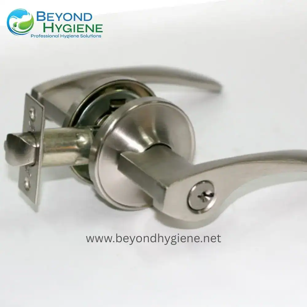 Stainless steel door lockset with lever handle, designed for professional hygiene solutions in commercial and healthcare environments. Beyond Hygiene offers reliable hygienic lock hardware.